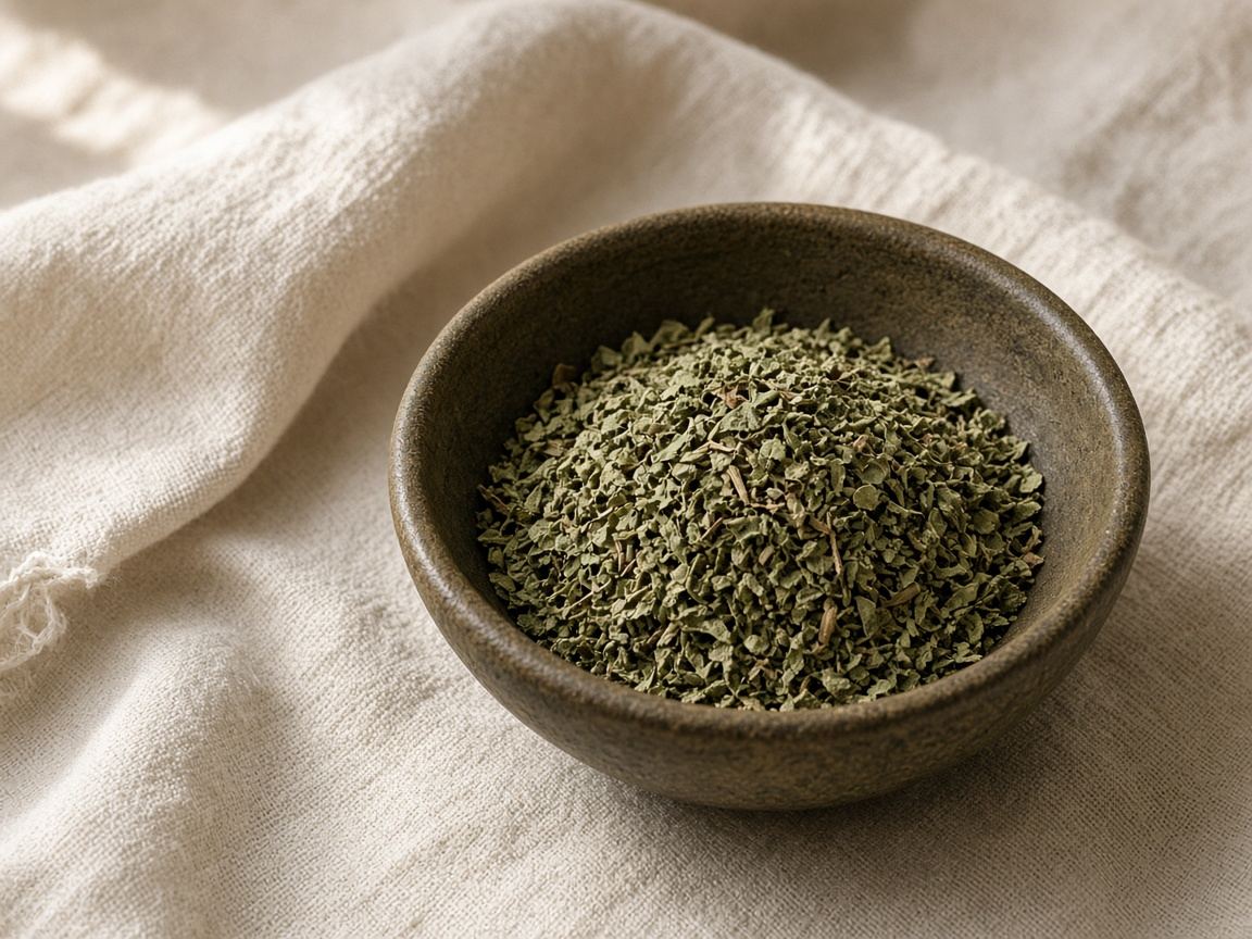 Dried guascas leaves in a small paper bag and bowl on a wooden table.